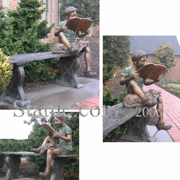 Boy Reading On Bench With A Dog
