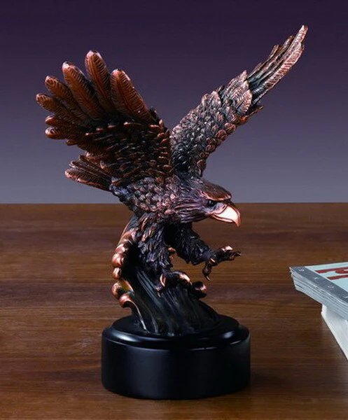 Eagle Statue Flying over Wave Sculpture