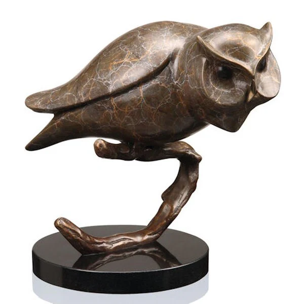 Owl on branch brass sculpture