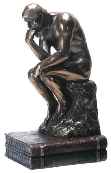 Thinker By Rodin Statue on Books